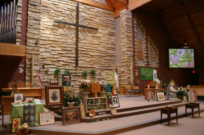An overview of flower art from members of Trinity Lutheran Church, Faribault, Minnesota, displayed in the chancel during weekend worship services.