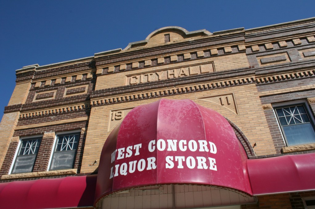 The West Concord Liquor Store, housed in a beautiful old building, once city hall. Minnesota Prairie Roots file photo.
