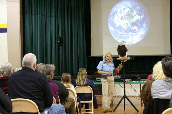 A bald eagle was part of the show in the gym. No, it did not fly.