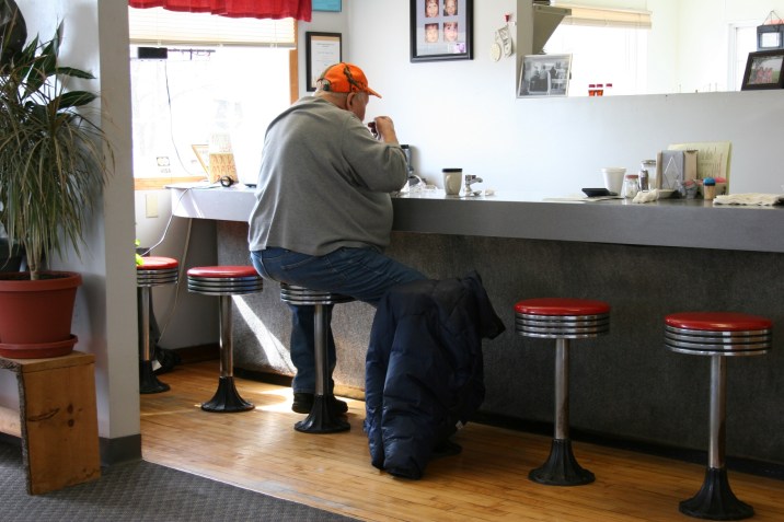 The charming lunch counter. Three other customers arrive at the diner after us.