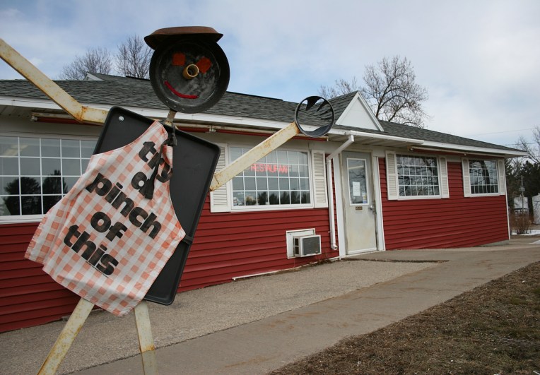 Quirky yard art outside the cafe.