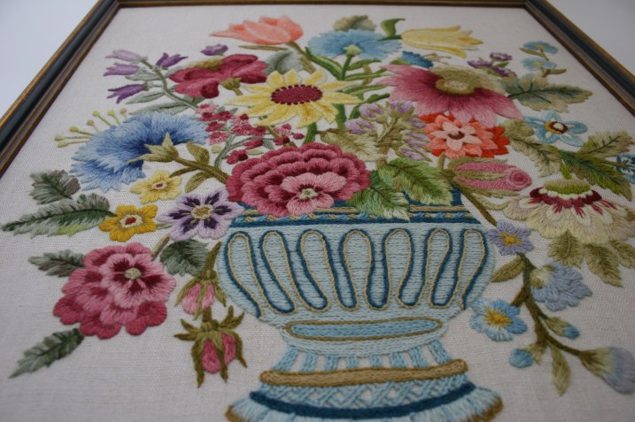 Crewel embroidery floral art, looking up