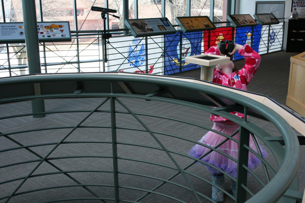 This girl is looking up at these...