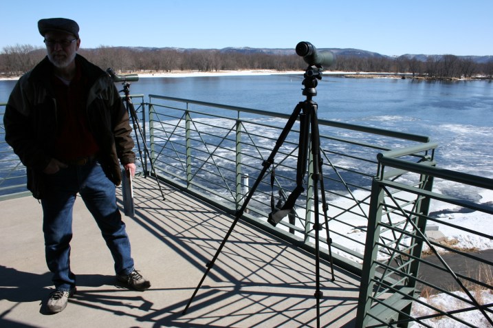 A second story observation deck outfitted with numerous binoculars, allows visitors to view the eagles along the Mississippi River.