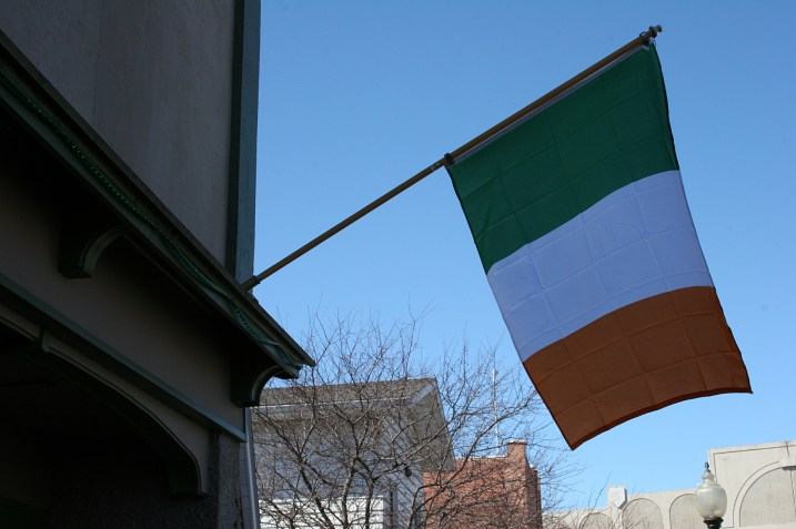 The Irish national flag flies outside the pub.