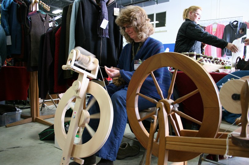 This woman spins fiber into yarn. I also observed two women grading alpaca fiber.