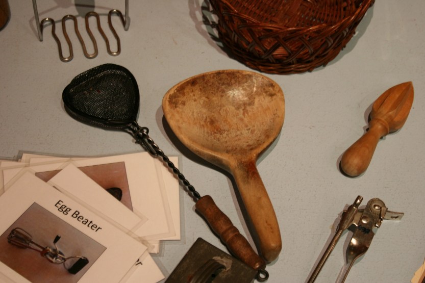 Old kitchen utensils for visitors to identify.