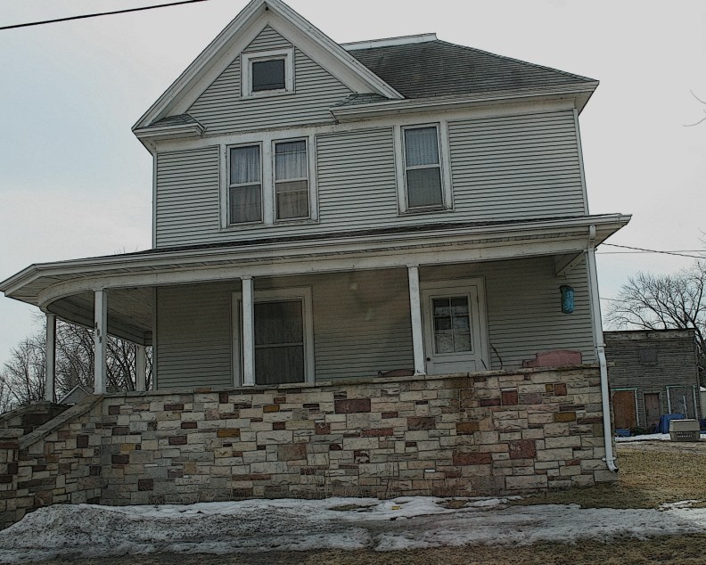 Open front porches, like this one on a home in Redgranite, Wisconsin, encourage neighborliness