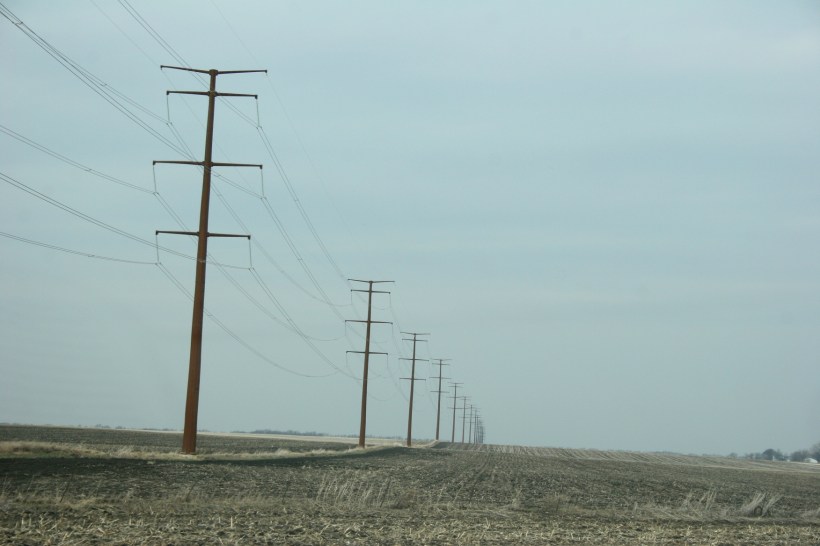 Newly-erected power lines, part of the Cap X2020 transmission line project, northwest of Morgan along Minnesota State Highway 67.