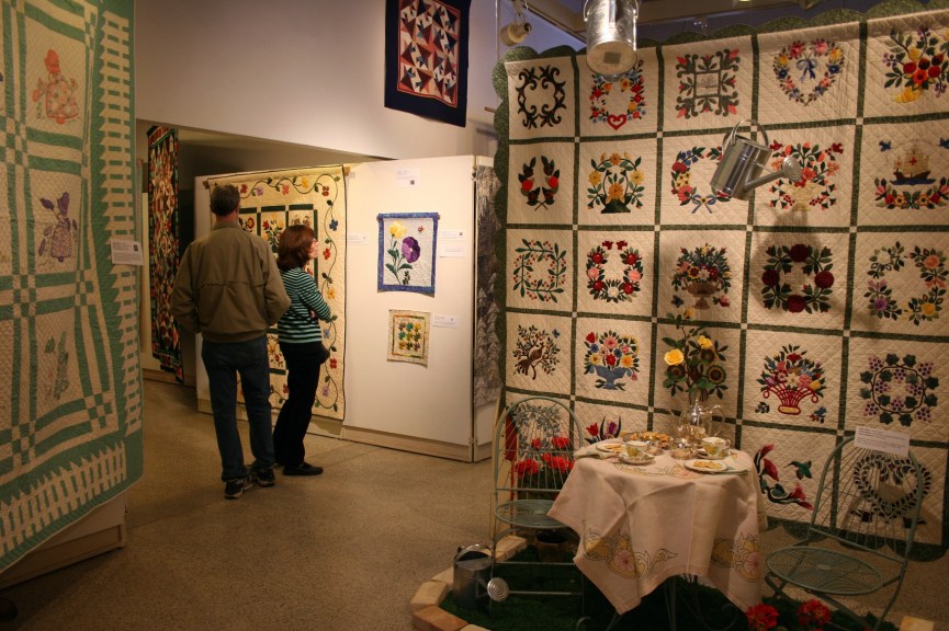 Touring the exhibit on opening day.