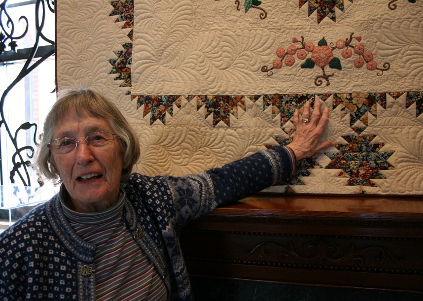 Artist Lois Doyle created "Mountain Laurel," a quilt she started 25 years ago. She has several quilts in the show. Laurie Spindler machine quilted this quilt.