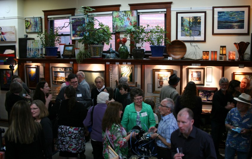 It was shoulder to shoulder people at the poet and artist reception.