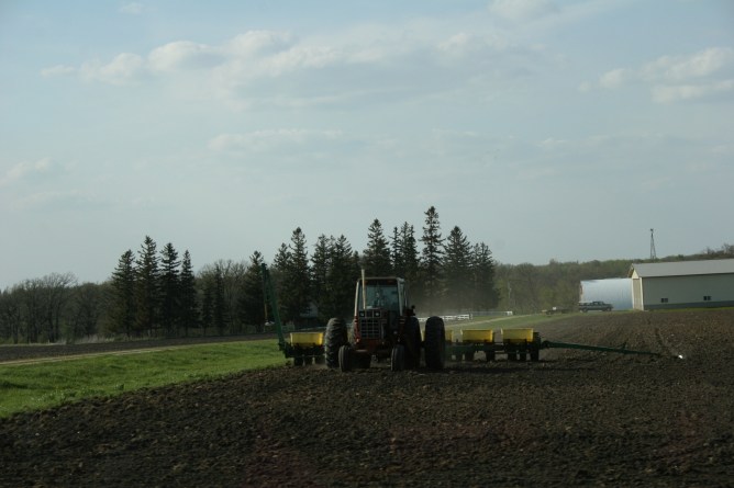 A farmer in the field Sunday evening along Minnesota State Highway 60 between Zumbrota and Faribault.