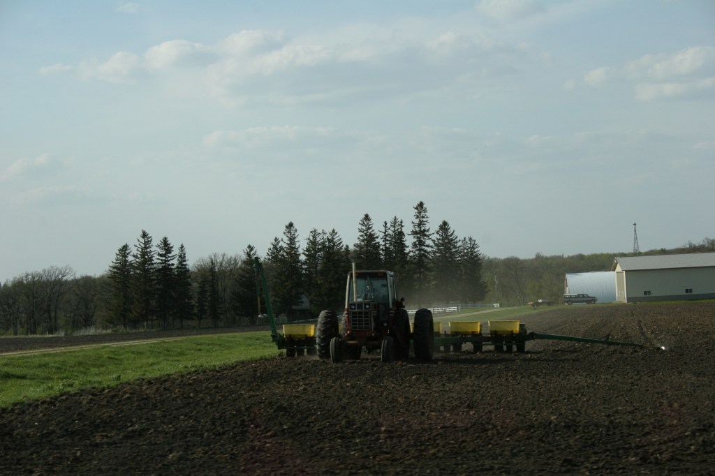 A farmer in the field Sunday evening along Minnesota State Highway 60 between Zumbrota and Faribault.