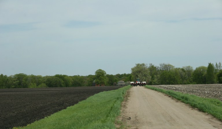 Field work, tractor on drive, west of New Ulm