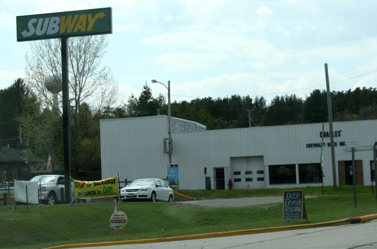 A quick roadside snapshot of the deep fried pizza sign along Wisconsin State Highway 21 in Wautoma.
