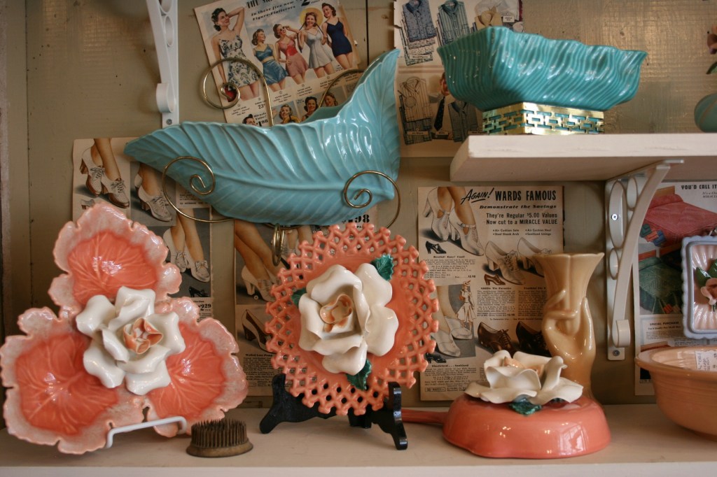 A backdrop of vintage magazine pages create visual interest.