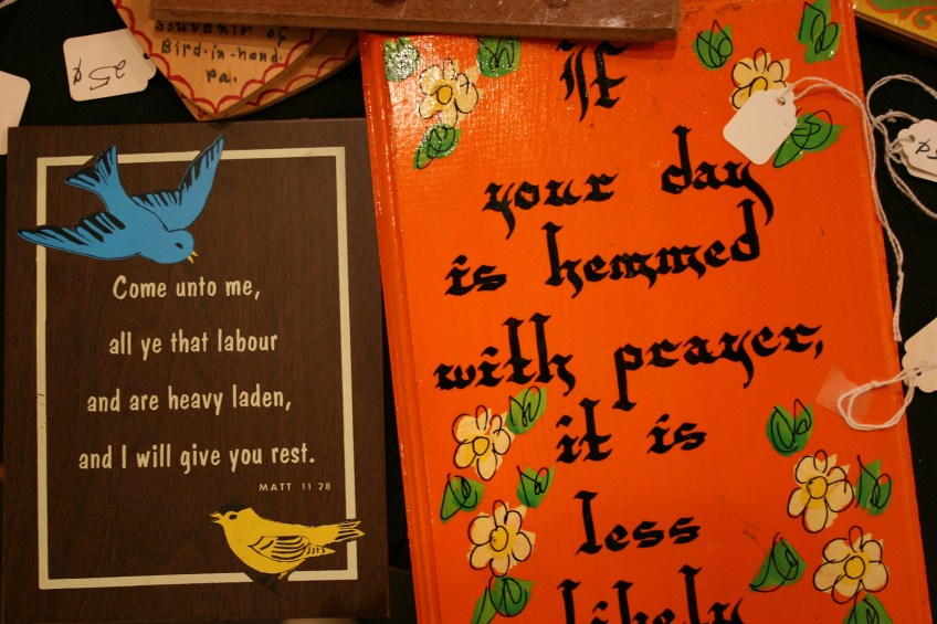 Kitschy bargain art plaques are among the art choices.