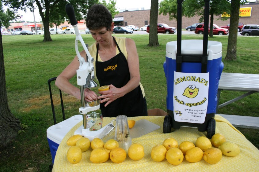 Barbara Sells of Mojoe 2 go prepares fresh lemonade for a customer.
