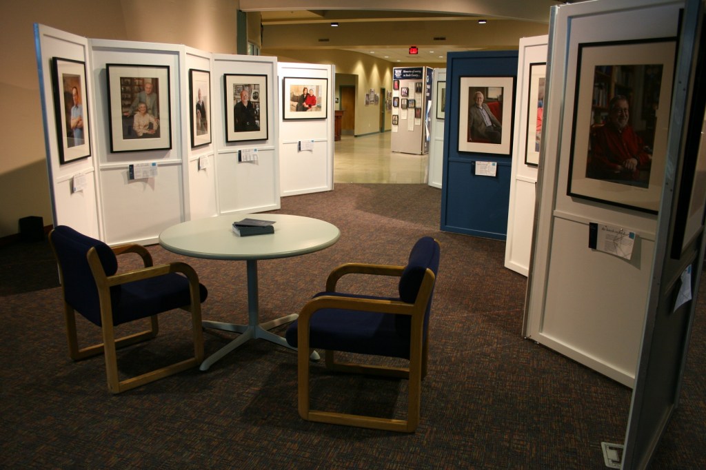 Panels of portraits and stories define "Transfer of Memory."