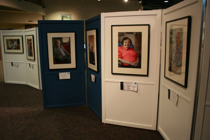 Panels showcase portraits and stories.