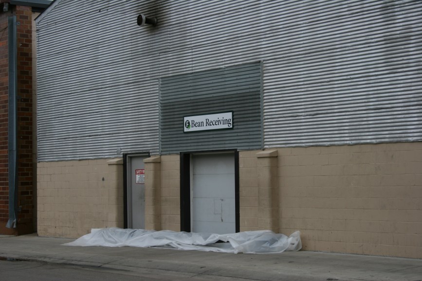 Sandbags border the door to bean receiving at Faribault Foods.