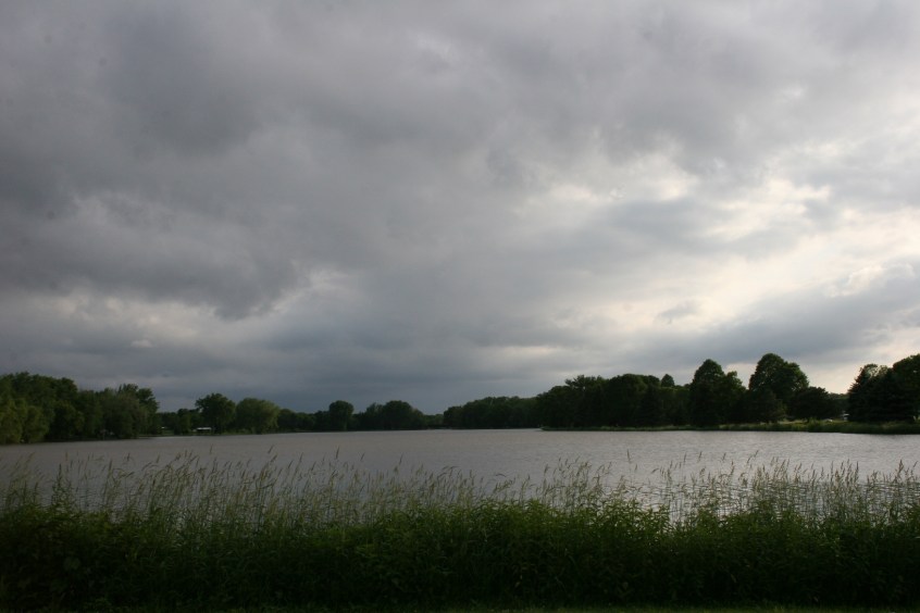 Early Thursday evening along the banks of the Cannon River in Faribault, clouds build to the west.