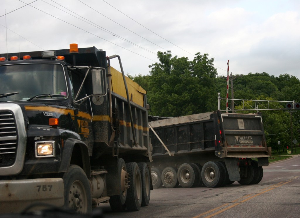 Working to protect the city's wastewater plant, which sits along the Straight River.