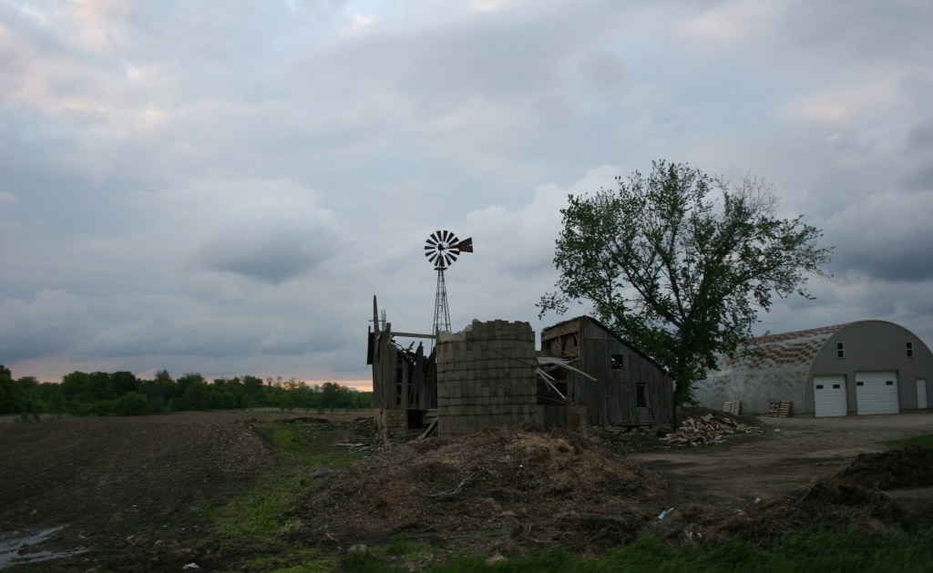 A decaying farm site along 220th Street East.