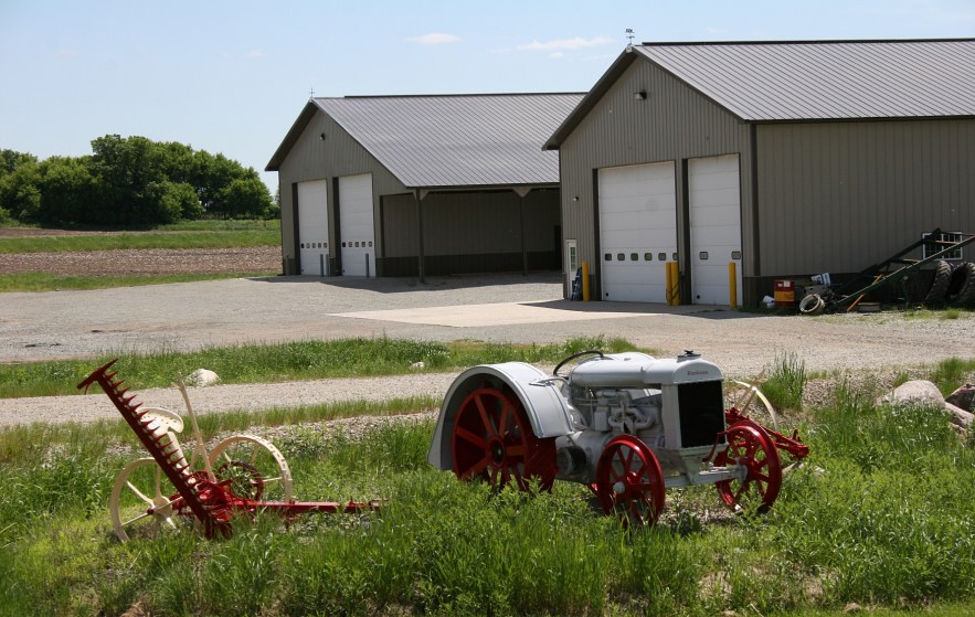 An aged Fordson parked alongside a road southeast of Faribault.
