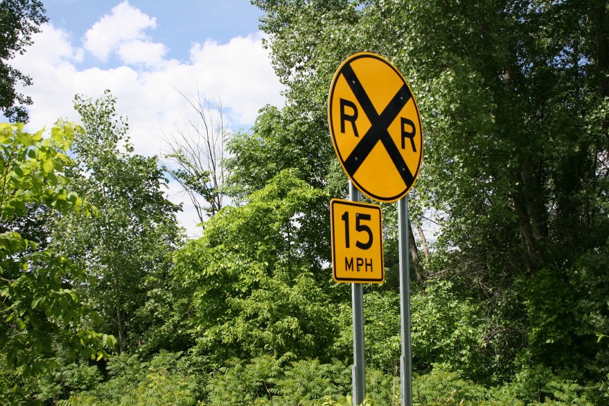 On the other side of the bridge, train tracks.