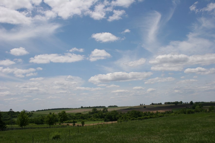 The countryside spreads out before us as we begin our drive.