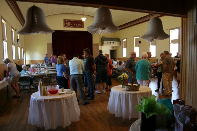 Guests linger as the party ends.