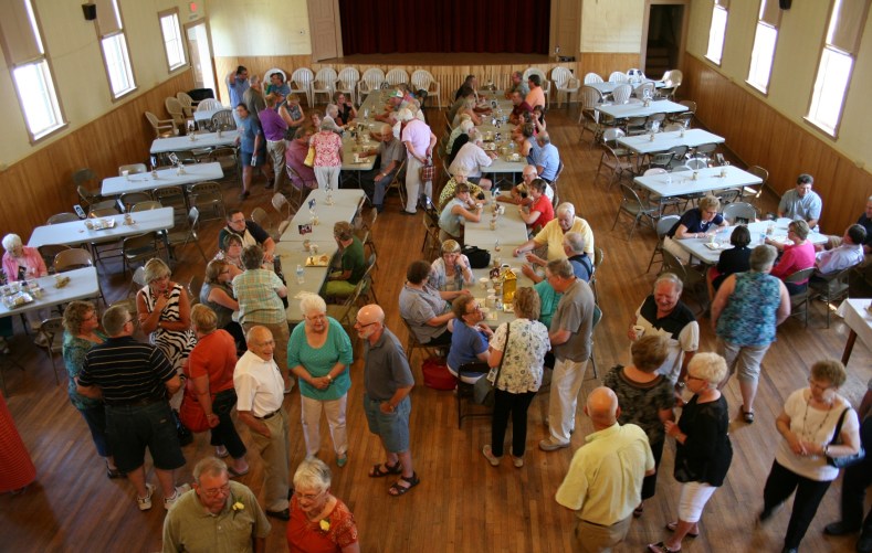 The crowd dwindles as the 50th anniversary party comes to a close.