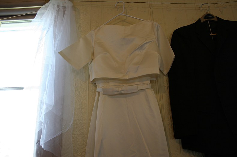 Iylene's wedding dress (which she sewed) and veil and Merlin's suit.