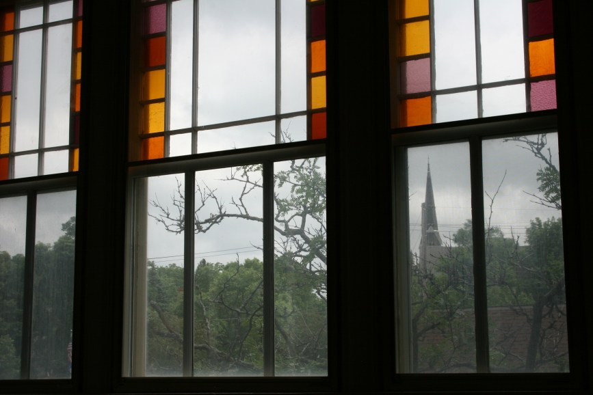 The Northfield Arts Guild showcases fine original art. But don't miss this stained glass window and the scene beyond it on the center's second floor.