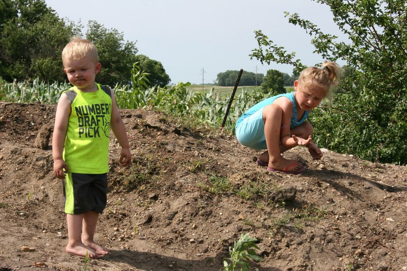 Boy and his dirt pile