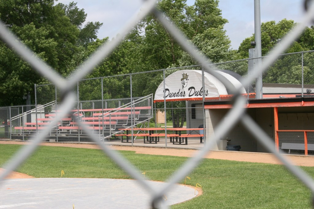 Looking through the fence toward the Dundas Dukes' dug-out.