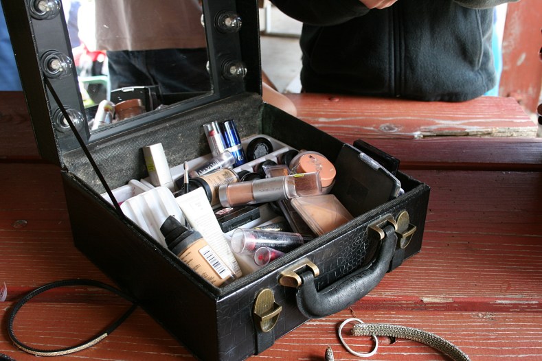 Teams formed and then the make-up case was opened for beauty make-overs on three guys.