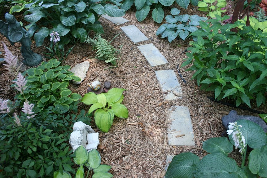 Shade-loving plants fill the Valhalla garden.
