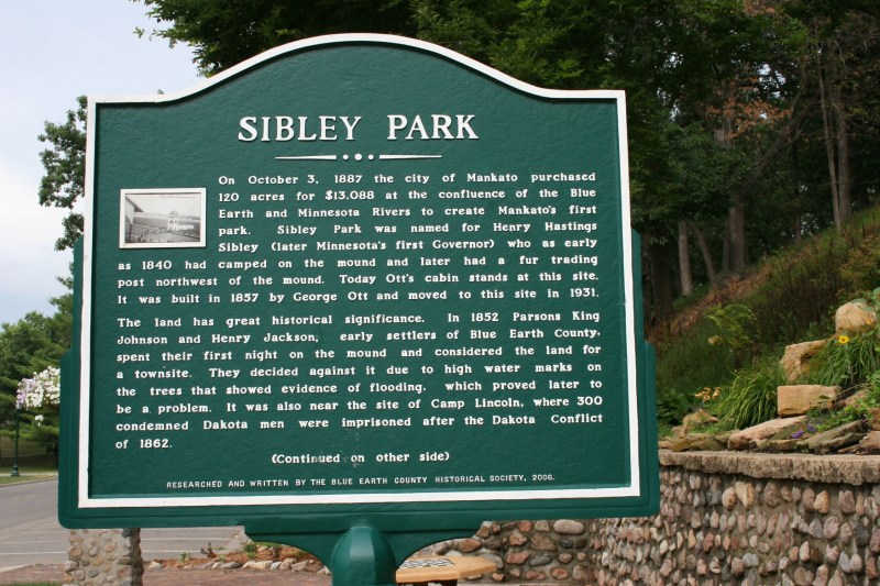 A sign explains the history of Sibley Park.