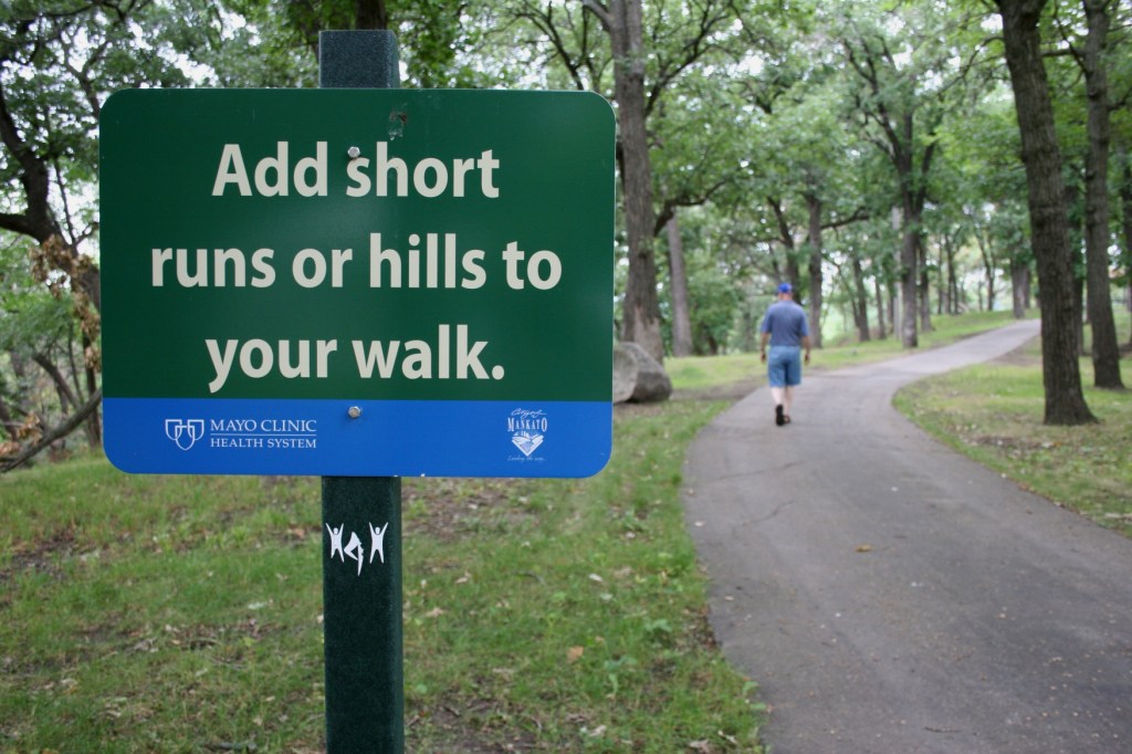 This sign near the CHS Pergola and atop the park's hill, encourages physical activity.