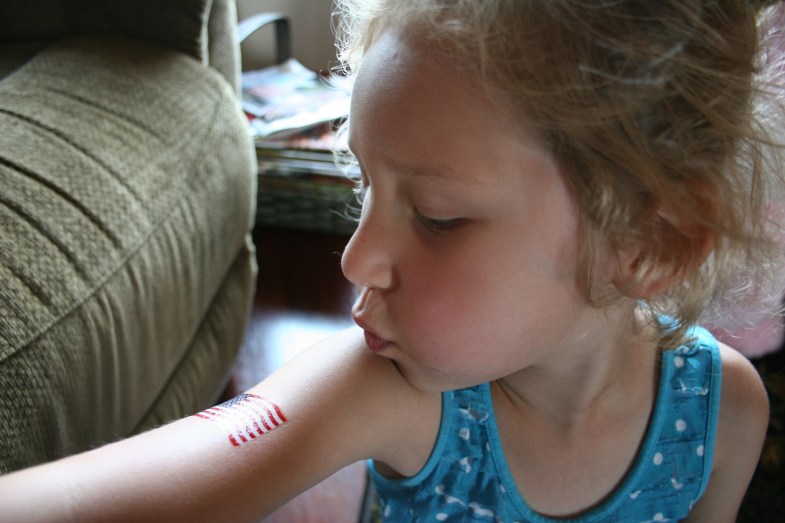 STEP THREE: Blow on the tattoo to dry it.