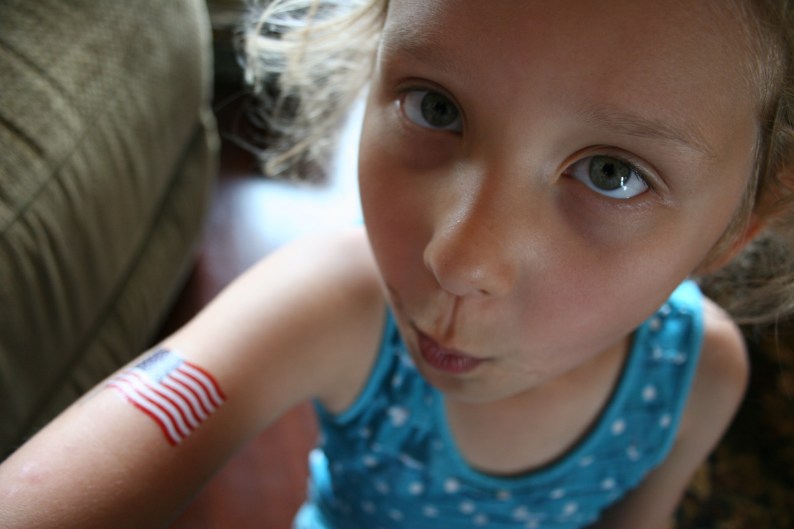 DISTRACTION: Even the distraction of the camera did not stop Ari from blowing.