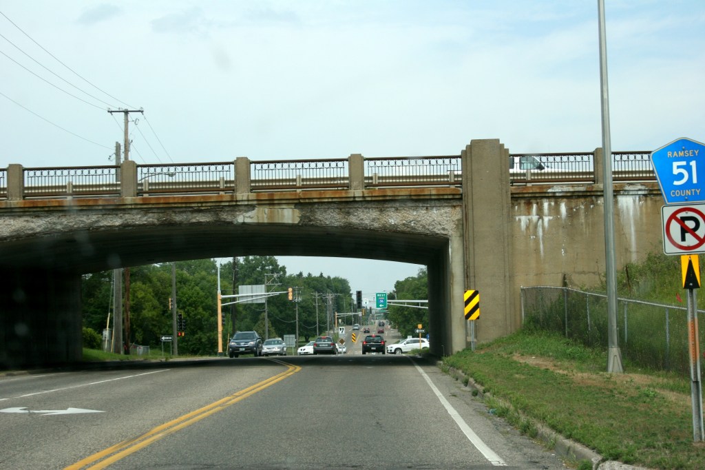 The Minnesota Highway 36 bridge over Ramsey County Road 51. (Shot taken through a dirty windshield, thus the spots on the image.)