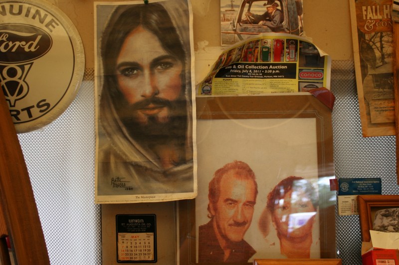 Among all the signage, I noticed this print of Christ in the garage.