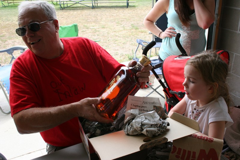 Marty, with his birthday gift bottle of whiskey, sports his out-law t-shirt.