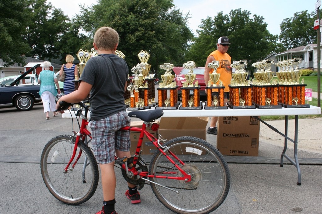 My absolute favorite moment, and shot, for the wistfulness. He was so immersed in admiring those trophies that he didn't even notice me snapping away.