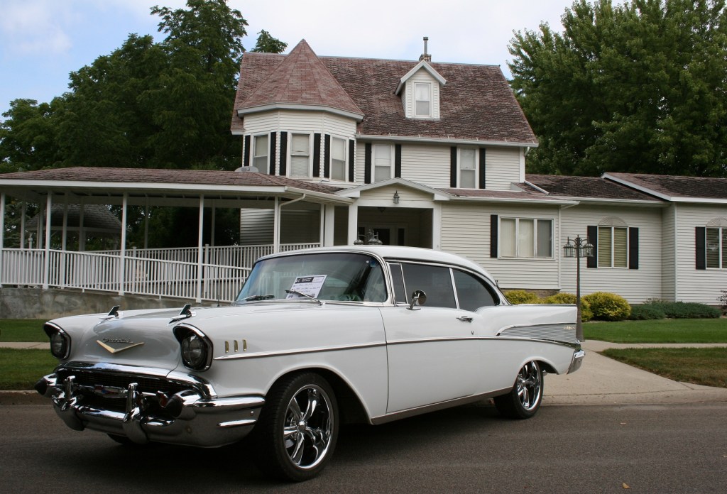Composing this image, I appreciated the melding of car and beautiful house. Turns out the house is a funeral home.