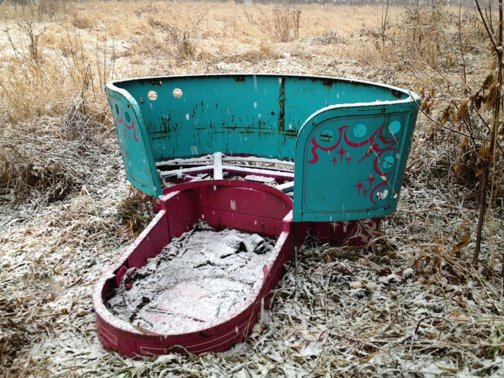 The Tilt-A-Whirl car before restoration was rescued from a junkyard.
